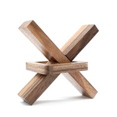 a wooden object that looks like an x - shaped object with one piece missing from it