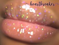 The Glitter Lipgloss for Pretties! Heartbreaker is simply magical. It reflects different glitter colors (purple, pink, green, blue) as the light hits it, super pretty. *Moisturizing & Silky *Non-Sticky *Infused With Coconut Oil, Vitamin E & Passion Fruit Scented. *Microfine cosmetic grade glitter safe for lips. Ingredients: Hydrogenated Polyisobutene (and) Ethylene/Propylene/Styrene Copolymer (and) Butylene/Ethylene/Styrene Copolymer, Coconut Oil, Passionfruit Rose Scent Oil, Cosmetic Gr Glitter Lipgloss, Glitter Lip, Cosmetic Grade Glitter, Diy Lip Gloss, Glitter Lip Gloss, Glitter Gloss, Diy Lips, Glitter Lips, Rose Scented Products