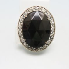 This lovely faceted black glass jewel pin is a Victorian Revival piece of a Victorian Mourning Brooch But it doesn't have to be just that as it is so simple and elegant with its antiqued goldtone metal setting. The pin measures 2 inches tall and 1 5/8ths inches wide. It has a secure locking safety clasp on the back and no markings. This will come to you in a lovely gift box for easy gift giving. If you like what you see, please check out my Etsy store at www.etsy.com/shop/PandPF Victorian Black Brooches For Gifts, Victorian Black Jewelry With Black Enamel, Antique Black Brooch For Gift, Antique Black Evening Brooch, Victorian Silver Oval Brooch, Pearl Hair Clip, Butterfly Hair, Pearl Hair, Hair Barrettes