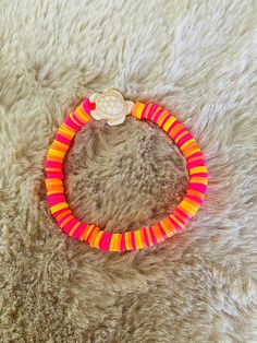 Clay bracelet made with bead spinner Bead Spinner Bracelets, Orange Beach Bracelets With Spacer Beads, Orange Heishi Beads Bracelets For Beach, Orange Large Beads Bracelets For Beach, Clay Bead Spinner, Bead Spinner, Bracelet Business, Homemade Bracelets, Bracelets Ideas