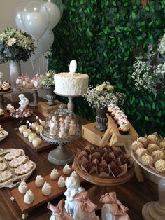 an assortment of desserts and pastries on a table