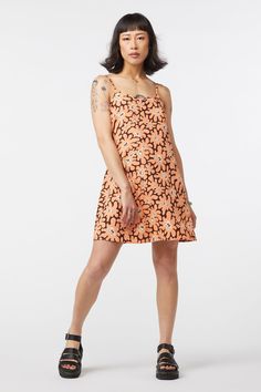 Step into style with this Printed Mini-Dress from Dangerfield. This mini dress combines effortless elegance with casual comfort, featuring spaghetti straps at the shoulders and a round-shaped neckline for a flattering, feminine look. A fabric tie at the back adds a touch of detail, while the zip closure at the side seam ensures a secure fit. Crafted from a luxurious blend of linen and cotton, the dress offers a light and breathable feel, making it perfect for those sunny days. Fabric & Care: Mat Cotton Sundress With Straight Neckline, Summer Trendy Slip Dress With Adjustable Straps, Trendy Summer Slip Dress With Adjustable Straps, Summer Floral Print Slip Dress With Square Neck, Summer Mini Slip Dress, Spring Brunch Mini Dress With Adjustable Straps, Summer Mini-length Slip Dress, Sleeveless Mini Dress With Tie Straps For Spring, Trendy Cotton Mini Dress With Spaghetti Straps