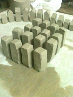 several blocks of concrete sitting on top of a table