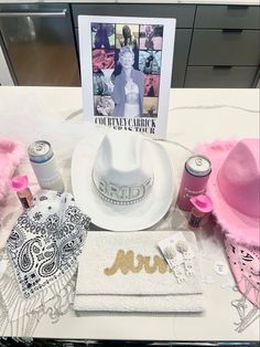 a table topped with pink and white items