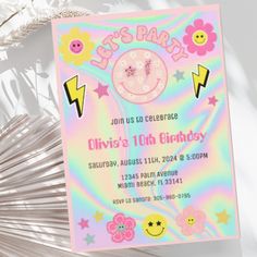 this is an image of a birthday party with flowers and smiley face on the front