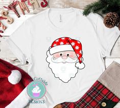 a white t - shirt with santa claus on it