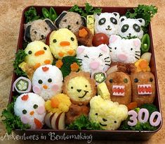 a box filled with lots of stuffed animals and veggies on top of a table