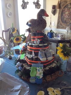 there is a cake made to look like a duck sitting on top of the table