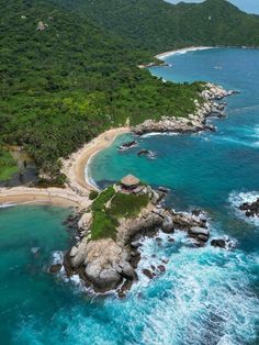 an aerial view of the beach and ocean