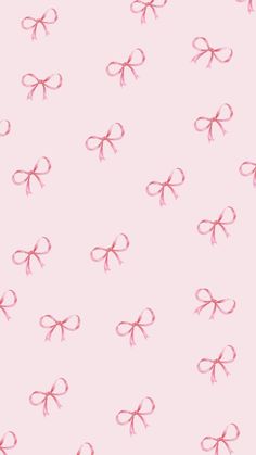 pink bows on a light pink background for wallpaper or wrapping paper that looks like fabric