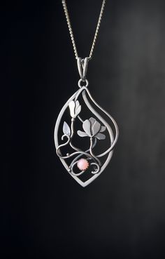 ITEM DESCRIPTION: The size H 5 cm x W 3 cm (1 3/4 x 1 inch). Weight - 4g. You can buy it with the chain or without. I made this blossom magnolia necklace of sterling silver and natural pink opal. It looks so elegant and sincerely! The gemstone has a light pink color - - the same as magnolia petals. The floral necklace is lightweight and comfortable This botanical pendant will be a great addition to your jewelry collection or a great gift for someone you love. Ooak jewelry made by eco-friendly ma Elegant Flower-shaped Large Pendant Jewelry, Elegant Flower Shaped Large Pendant Jewelry, Metal Jewelry With Flower Charm And Pendant, Elegant Floral Large Pendant Jewelry, Nature-inspired Jewelry With Flower Charm, Nature-inspired Flower Charm Pendant Necklace, Elegant Birth Flower Pendant Necklace, Unique Flower Pendant Wedding Jewelry, Silver Metal Flower Pendant Necklace