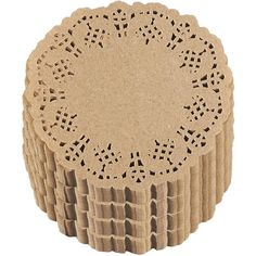 several pieces of cardboard doily on a white background