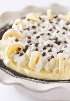 a pie with chocolate chips and bananas on top