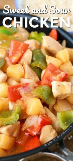 a skillet filled with chicken and peppers