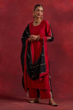 Black and red raw silk colour block kurta with placed gota work embellished detail. Comes with matching palazzo and dupatta. - Aza Fashions Red Cotton Silk Party Sets, Red Cotton Silk Dupatta With Gota Work, Red Cotton Silk Salwar Kameez With Gota Work, Designer Red Traditional Wear With Zari Work, Designer Traditional Wear With Red Zari Work, Red Raw Silk Set With Mirror Work, Designer Red Traditional Wear For Festive Occasions, Designer Red Traditional Wear For Festive Season, Designer Red Party Set