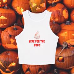 Here for the Boo's - Your New Go-To Tank! Get ready to haunt the scene in style with our "Here for the Boo's" Women's tank top! Crafted from a luxurious blend of 52% Airlume combed and ring-spun cotton with 48% polyester, this tank is all about that ultra-soft, breathable feel that keeps you comfy whether you're out trick-or-treating or just chilling with the crew. Designed with a fitted racer-back that hugs your body just right, this tank features a chic 1x1 micro ribbed texture for a sleek, flattering fit. The high neck design adds a modern twist, while the mid-length cut makes it perfect for layering or wearing solo. Available in Athletic Heather - a fab blend of 90/10 Airlume combed and ring-spun cotton/polyester - this tank isn't just stylish, it's versatile enough to rock at the gym, College Halloween Party, Hot Halloween, Halloween Tank Top, Hot Halloween Outfits, College Halloween, Outfit Halloween, Halloween Top, High Neck Designs, Girls Halloween