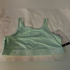 Nike Pro Girls Dry-Fit Sports Training Bra. Nwt. Seafoam Green. Size M. Nike Winter Jackets, Girls Sports Bras, Tops Nike, Nike Crewneck, Nike Jersey, Nike Long Sleeve, Nike Zip Up, Nike Tank Tops, Nikes Girl