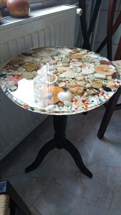 a table that has cookies on it and is sitting in front of a radiator