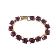 This vintage women's tennis bracelet showcases a 14+ carat purple amethyst gemstone, which has been lab-created and is perfectly round in shape. The gemstone is set in a gold tone metal with slight signs of wear, stone with minor loss,, but is still in overall good condition. Measuring 6.75 inches in length and 0.25 inches in height. Elegant Round Amethyst Crystal Bracelet, Amethyst Tennis Bracelet As A Gift, Elegant Round Purple Crystal Bracelet, Elegant Purple Round Crystal Bracelet, Classic Purple Tennis Bracelet As A Gift, Classic Purple Tennis Bracelet As Gift, Classic Purple Tennis Bracelet Perfect For Gifts, Purple Tennis Bracelet For Anniversary, Purple Round Bracelets For Anniversary