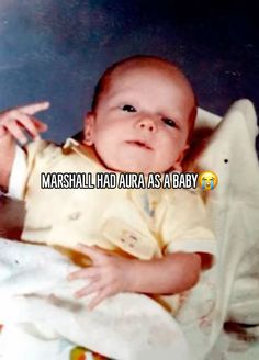 a baby is sitting in a highchair with the caption marshall had alura as a baby