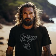 INSTANT DOWNLOAD - no physical item will be delivered Introducing our Rugged Beachside Black T-Shirt Mockup, showcasing a man with flowing long hair against the backdrop of the beach. This mockup exudes an untamed, free-spirited vibe, perfectly complemented by the classic black tee. It's the ideal canvas for designs that embrace raw, authentic appeal. Whether it's for beach lovers or those who resonate with the rugged aesthetic, this mockup captures the essence of carefree spirit and individuality. Once your payment is cleared, you will receive an email with the download link. You can also access your purchase via your Etsy profile. Download the files, and start working on your images.  The high-resolution JPG file of t-shirt mockup will be blank and without any watermarks. Use any image e Beach Photoshoot T-shirts & Tank Tops, Black Graphic Tee For Surfing, Black Tee Mockup, Retro Black Washed T-shirt, Black Relaxed Fit T-shirt For Surfing, Beach Wear Men, Skin Retouching, Base Image, Out Of Shape