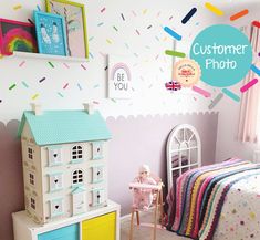 a child's bedroom decorated in pastel colors and sprinkles