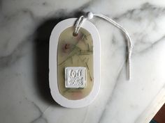 a soap bar with the words you are loved on it sitting on a marble counter top