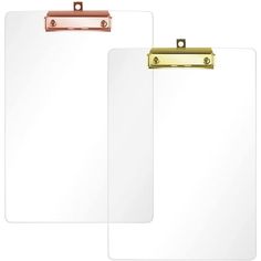 two clipboards with metal clips on each side and one has a blank paper attached to it