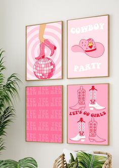 three pink posters are hanging on the wall above a wicker basket and potted plant