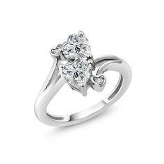 a white gold ring with two pear shaped diamonds