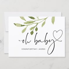 a white card with green leaves and the word oh baby on it in black ink