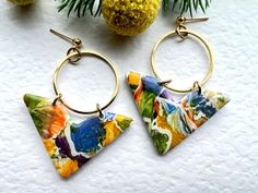 "Looking for a unique piece of jewellery to make a bold statement? Look no further than these striking Orange, Blue and Green Marble Drop Earrings!  These unique handmade earrings are carefully handcrafted using watercolour technique , being hand painted with heavy body acrylic paints . They have gold plated stainless steel post studs and findings (for sensitive skin). Whether you're buying them as a birthday gift for your best friend, or as a treat for yourself, these earrings are sure to turn heads. So why wait? Add them to your cart today and make a statement with your style! They are modern and one of a kind. Very lightweight & comfortable  and easy to wear. They are available in different unique styles ; measurements at widest & longest point: * V shape  : 5.8cm long x 4.0cm wide * di Blue Triangle Earrings For Gift, Artsy Blue Earrings For Party, Artsy Blue Jewelry For Party, Unique Triangle Earrings As A Gift, Birthday Gift For Best Friend, Homemade Clay, Unique Handmade Earrings, Resin Jewelry Diy, Hand Painted Earrings