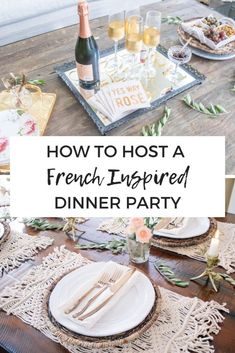 a table with plates and wine glasses on it that says how to host a french inspired dinner party