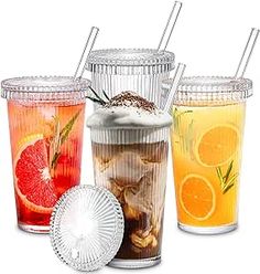 four different types of drinks in plastic cups