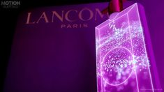 an illuminated shopping bag with the word lancom paris on it