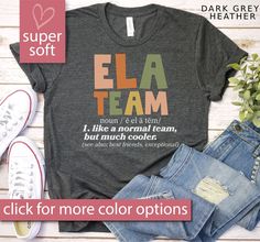 a t - shirt with the words ela team on it next to jeans and sneakers