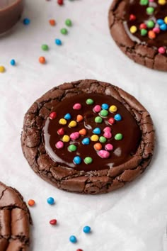 chocolate cookies with sprinkles and chocolate frosting