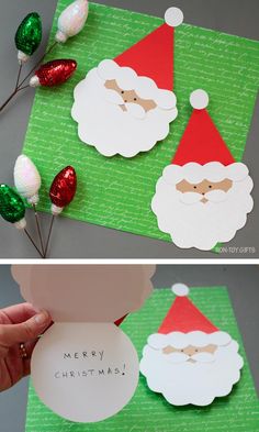 santa clause cut out from paper and placed on top of a green sheet of paper