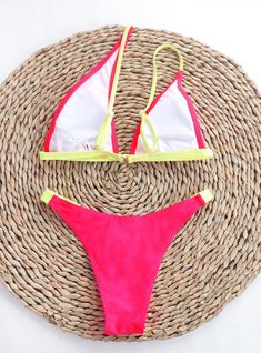 Lilacoo brings a cool classic this season with the Pink Cropped Bikini Top. This ultra-comfy bikini top showcases a cropped silhouette with fixed straps. Pair it with the Pink Cut Bikini Bottom, another ultra-comfy bikini bottom with a low-rise fit, high-cut leg, scoop front detail, and cheeky seat coverage. This classic and chic set is perfect for any beach or pool day. Pattern style: sexy, tightFabric name: nylonFabric composition: nylonFabric content: 80(%)Weight: 140(g)Name of lining: polyesterLining composition: polyester fiber (polyester)Size: S,M,L,XLSleeve length: sleeveless Trendy T-back Swimwear For Summer, Trendy Triangle Top Swimwear In Solid Color, Trendy Triangle Top Swimwear, Neon Swimwear For Pool In Spring, Neon Beachwear For Spring, Pink T-back Swimwear For Vacation, Neon Swimwear For Summer Poolside, Trendy Neon Swimwear For Spring, Neon Summer Swimwear For Poolside