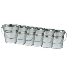 six buckets with handles are lined up in a row