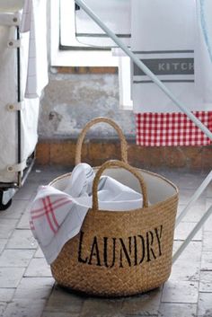 a laundry basket with the word laundry on it