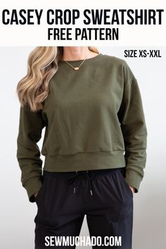 a woman wearing a green crop sweatshirt and black sweatpants, with the text casey crop