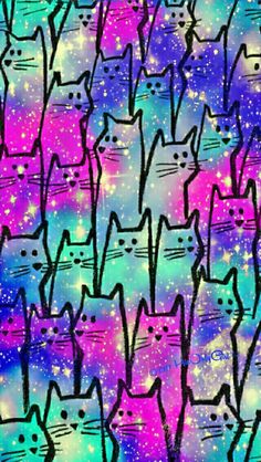 many cats are standing together in the space