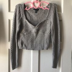 Never Worn! Super Cute Corset Style Cropped Sweater. I Love The Cable Knit Details Throughout. Style Cropped Sweater, Corset Sweater, Cute Corset, Rust Sweater, Oversized Grey Sweater, Bell Sleeve Sweater, Off Shoulder Sweater, Forever 21 Sweater, Boatneck Sweater