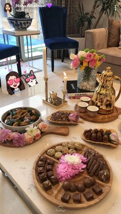 a table topped with lots of chocolates and candies