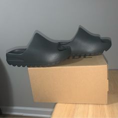 Adidas Yeezy Slide Dark Onyx Kids . Kids Size 13k , 1y , 2y . New With The Original Box . #Adidas #Yeezy #Slides Adidas Yeezy Slides, Adidas Yeezy Slide, Yeezy Black, Yeezy Foams, Yeezy Slides, Yeezy 500, Yeezy Shoes, Adidas Yeezy Boost 350, Kids Sneakers