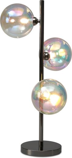 three glass balls on a metal stand with black base and chrome plated legs,