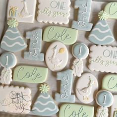 decorated cookies in the shape of baby's first year