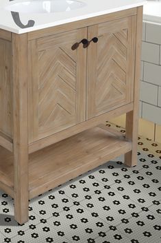 a bathroom vanity with two drawers and a sink