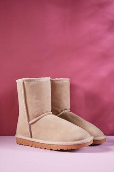 Keep your feet cozy and comfortable with the Smaibulun Lovett Wool Lined Suede Shearling Ugg Boots. Crafted with soft, durable suede and lined with snug wool, these stylish boots envelop your feet in warmth and coziness. Step out in style and experience the ultimate comfort of Lovett wool! 0.98'' heel 7.6'' shaft 15.8'' circumference Pull-on Suede upper Blend wool lining Man-made EVA sole Sand Winter Boots, Beige Shearling Boots With Suede Lining, Shearling Boots With Rubber Sole, Beige Suede Slip-on Boots, Brown Shearling Boots With Leather Sole, Reindeer Headband, Shearling Boots, Stylish Boots, Sand Color